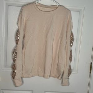 Sweater with cut out sleeves